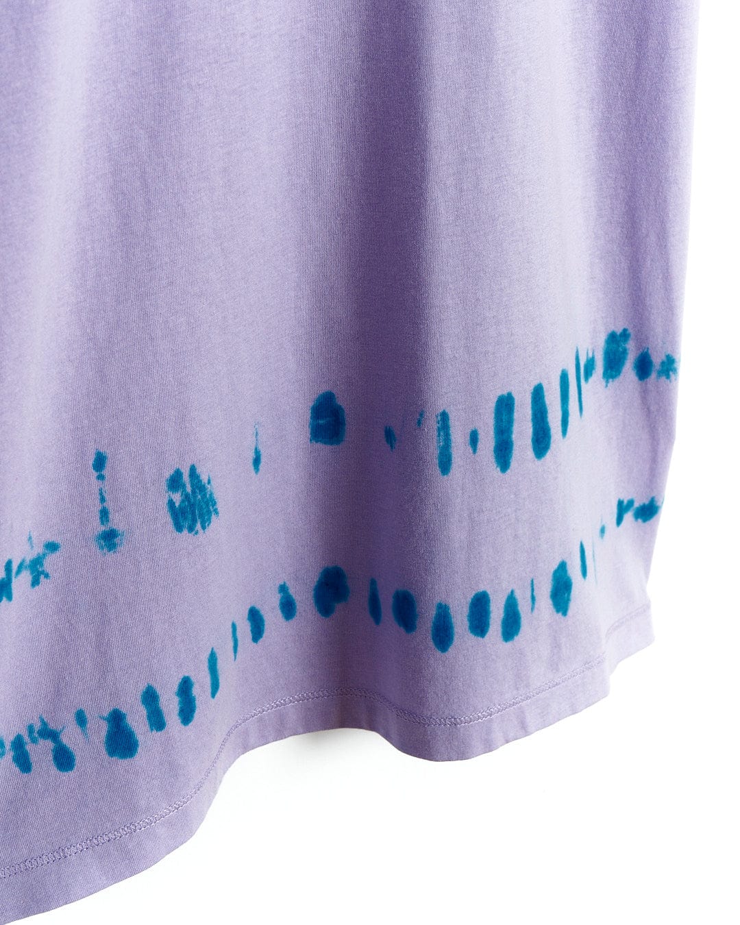 A Saltrock Hardskate - Kids Tie Dye T-Shirt Dress - Purple with blue dye on it.