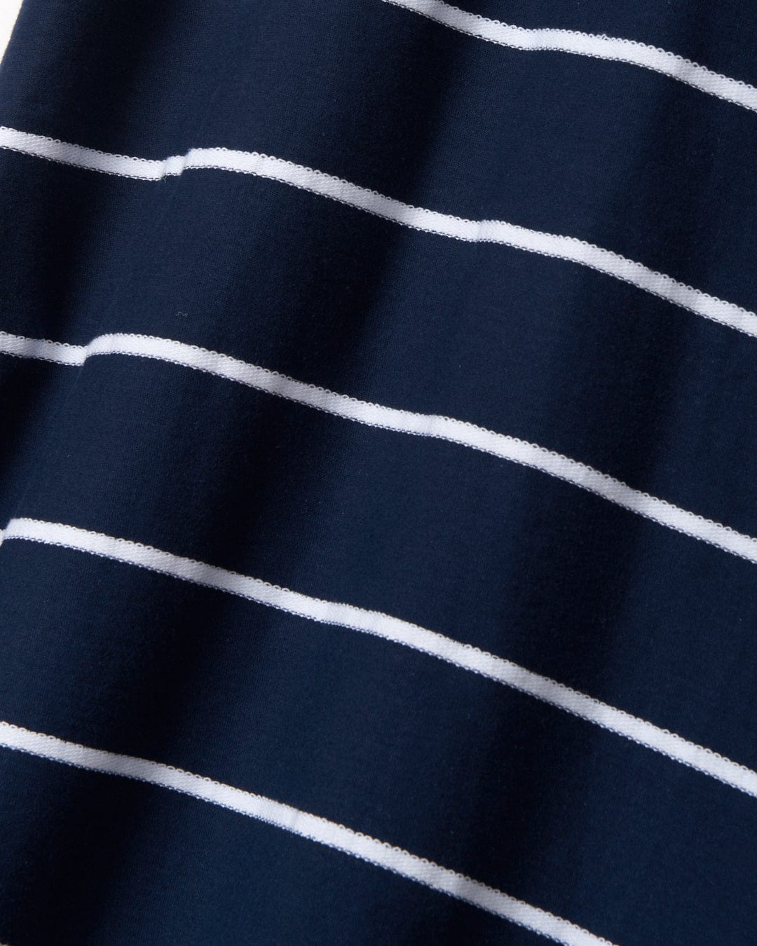 A close up of the Saltrock Hartland Cap - Womens Dress - Navy with a peached soft hand feel finish.