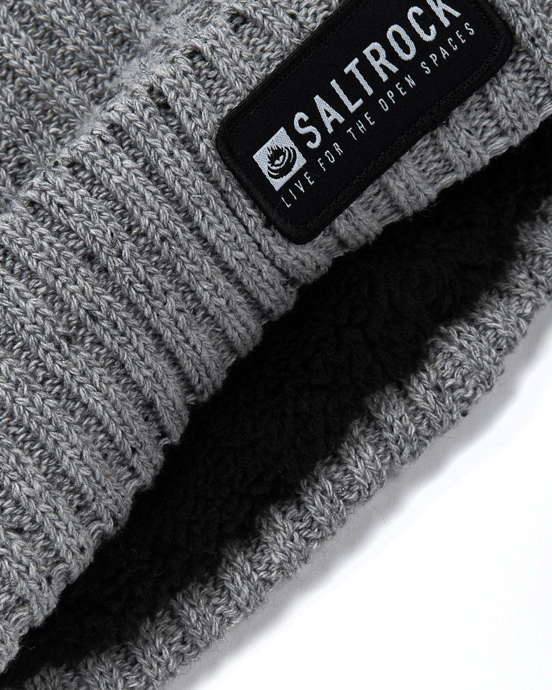A Heritage - Beanie - Grey with the Saltrock logo on it.
