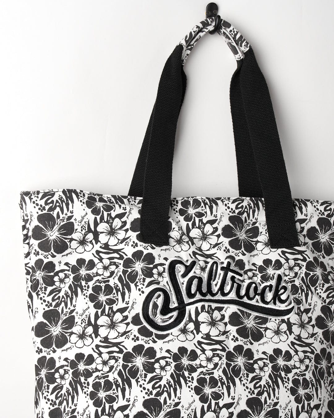 Floral print cotton tote bag with black straps and "Saltrock" branding
will become
Hibiscus Shopper Bag - Black by Saltrock.