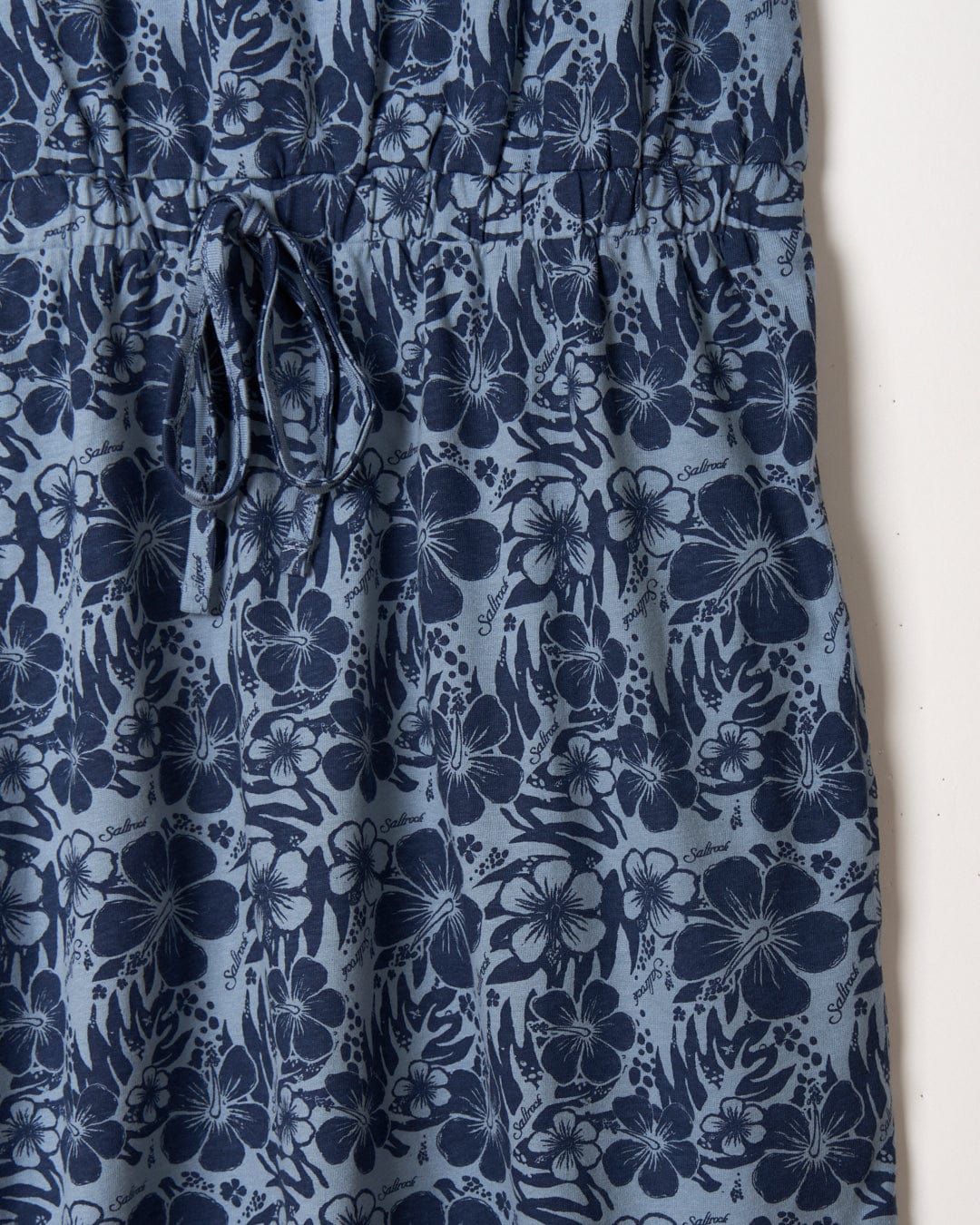 Close-up of a Saltrock Hibiscus Bauhaus Womens Midi Dress - Blue with drawstring details.