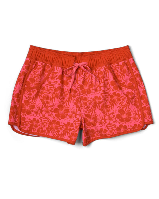 These Saltrock Hibiscus women's boardshorts feature a vibrant red and pink floral print design. Made with Repreve recycled material, they offer 4 way stretch for added comfort.