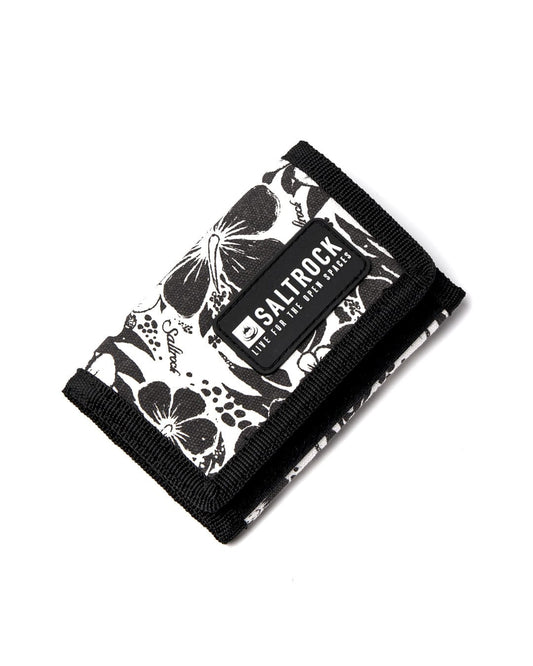 A black and white hibiscus print Saltrock Hibiscus Tri-Fold Wallet in a tri-fold design on a white background.
