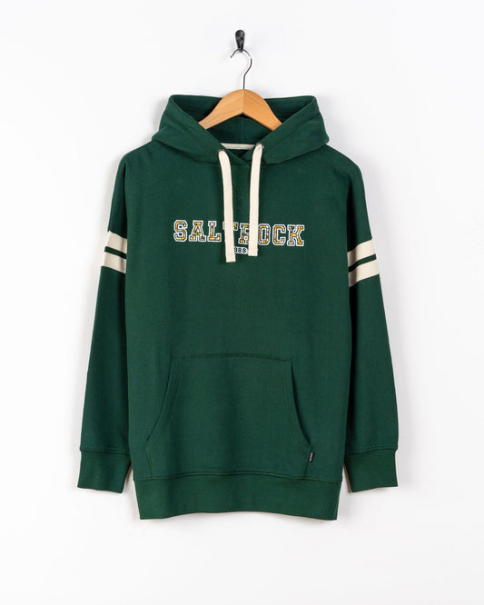 The Saltrock Campus Floral Women's Pop Hoodie in dark green, made from 100% cotton, features white drawstrings, a front pocket, and "SALTROCK" on the chest. Shown on a hanger against a white background.