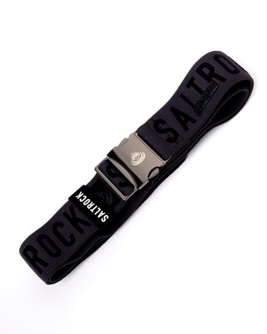 A black belt with the Saltrock branding is adorned with the word "rock sailor" and features a metal clip buckle.