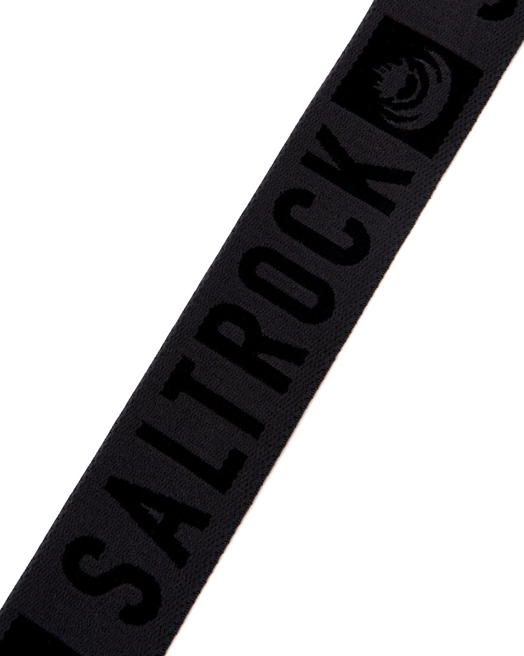 A Identity - Stretch Belt - Black with Saltrock branding and a metal clip buckle.