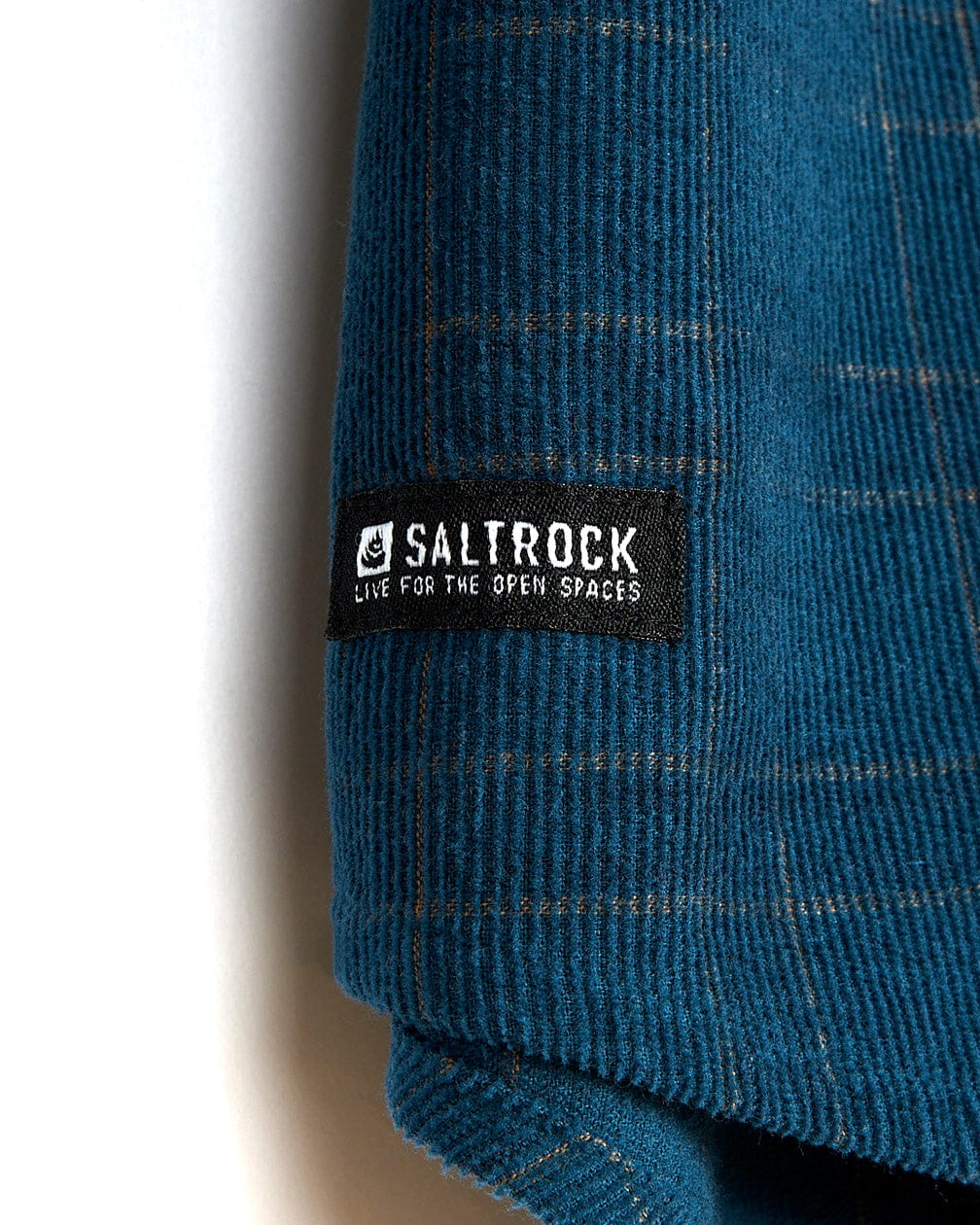 A Jaxon - Mens Check Long Sleeve Shirt - Dark Blue with the Saltrock logo on it.
