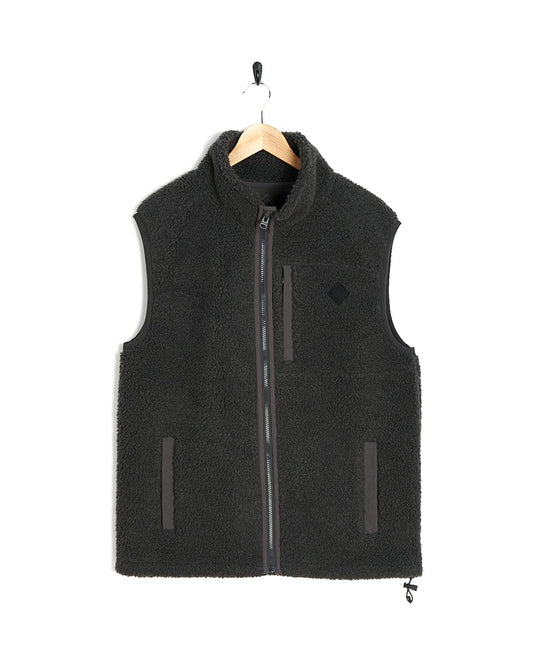 A Joel - Mens Sherpa Fleece Gilet - Dark Grey by Saltrock hanging on a hanger.