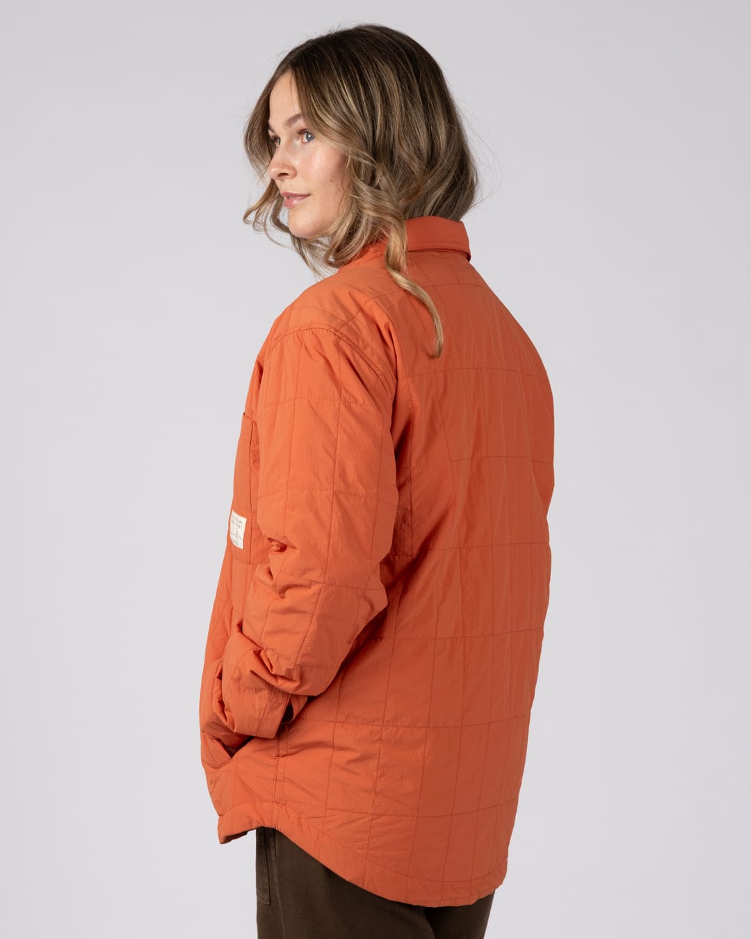 Dione Womens Quilted Water Resistant Jacket in Orange