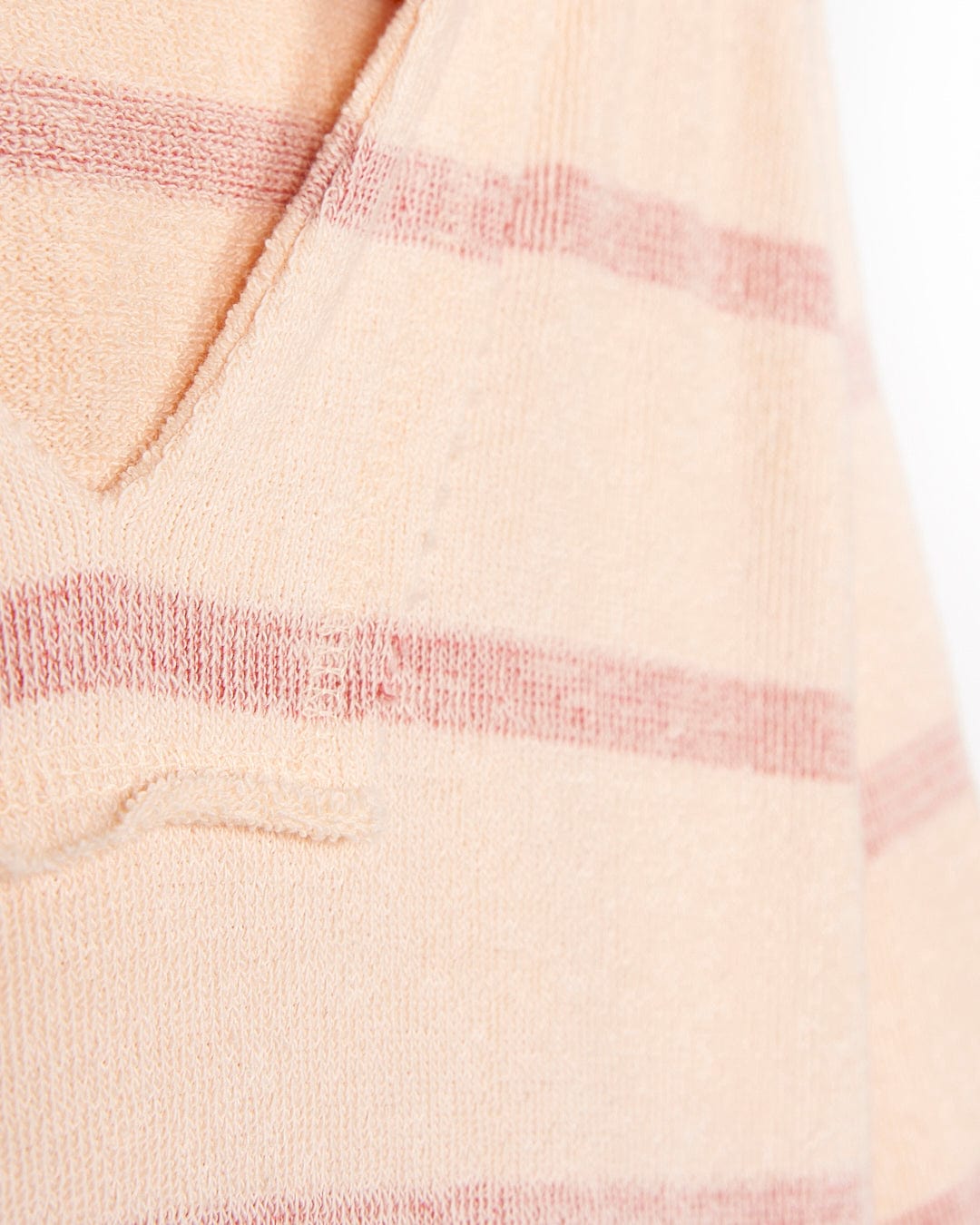 A close up of a Saltrock Kennedy - Kids Pop Hoodie - Coral striped sweater.