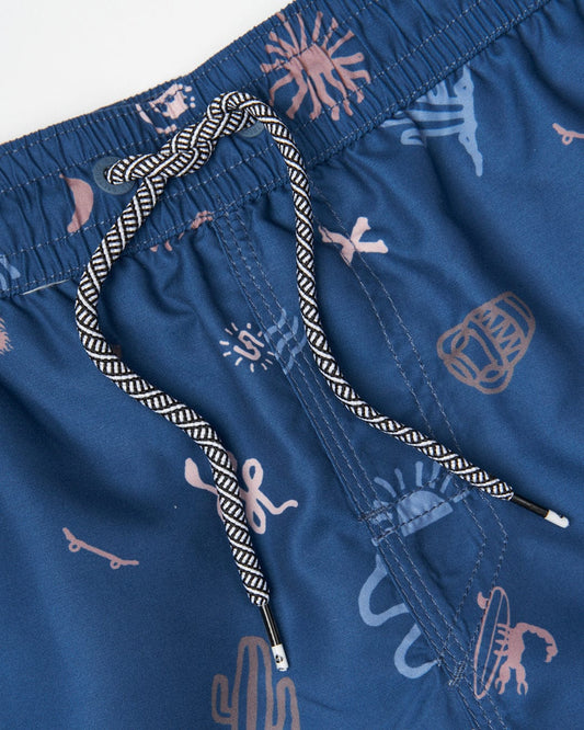 Close-up of Saltrock Last Stop Men's Swimshorts in Blue with marine life all over print and a black and white drawstring.