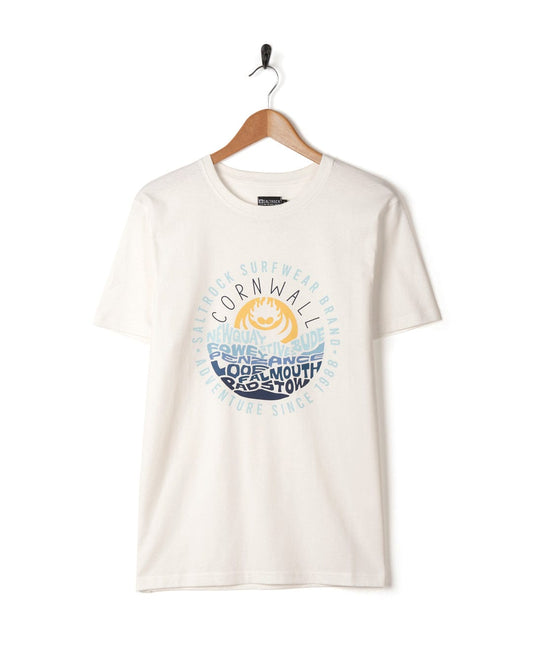 A Layers Cornwall white cotton t-shirt with an image of the sun from Saltrock branding on it.