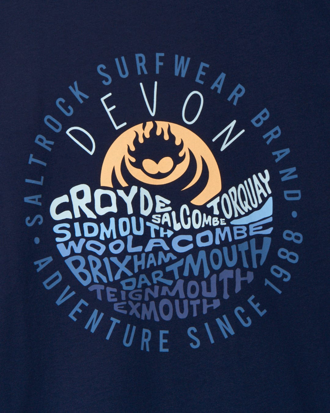 A crew fit t-shirt with the words Layers Devon on it, made of peached soft material from Saltrock.