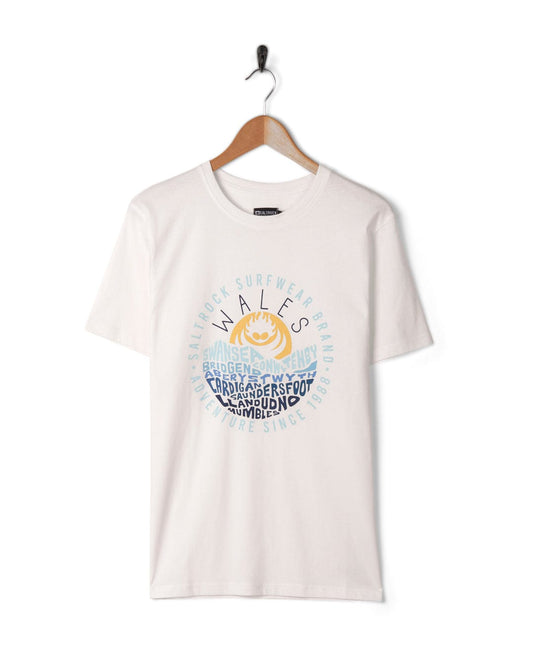 A Layers Wales - Men's Short Sleeve T-Shirt in white with an image of the sun and waves, featuring Peached soft material by Saltrock.