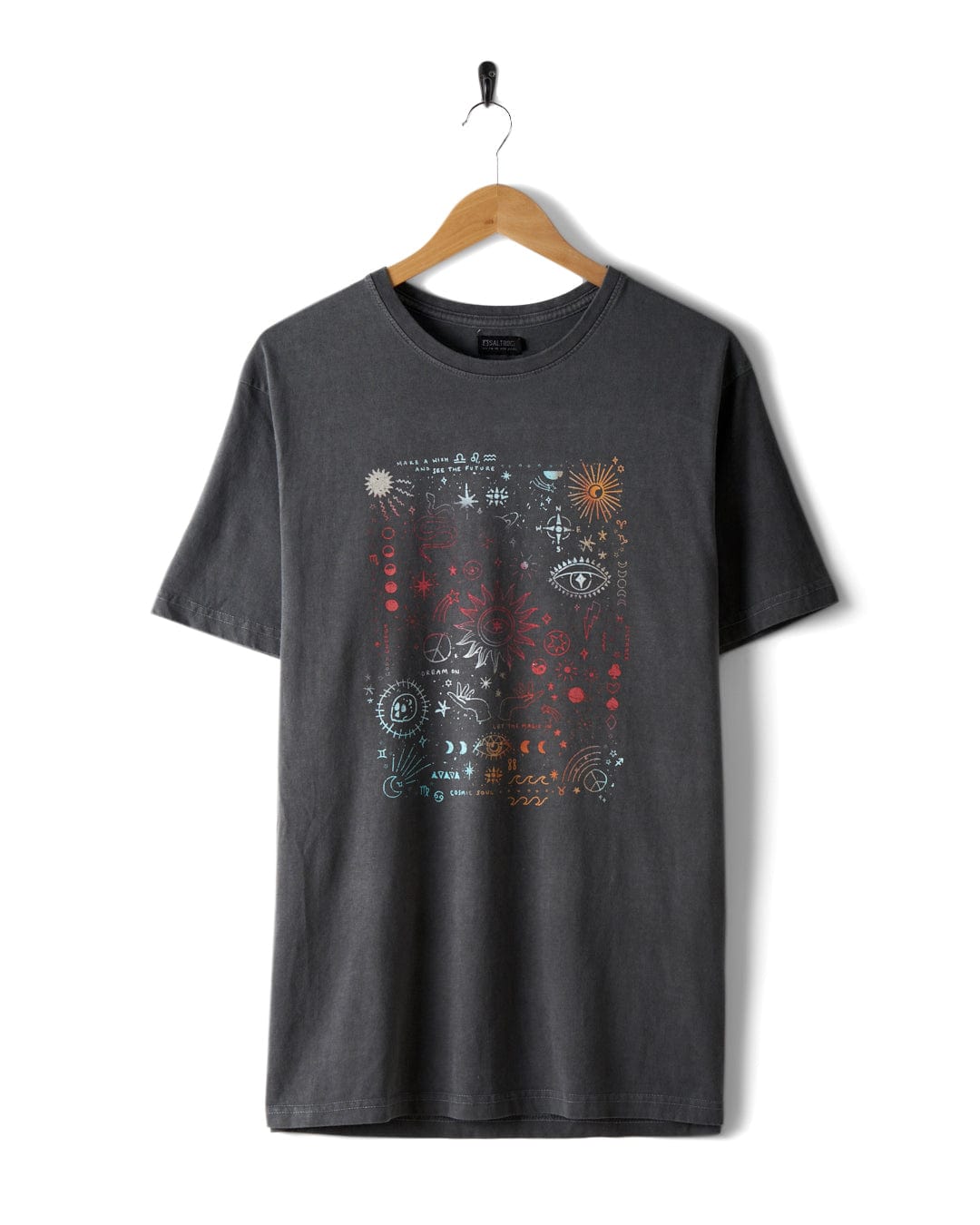 The "Let The Magic In - Womens Oversized T-Shirt - Washed Grey" by Saltrock is a 100% cotton, oversized t-shirt in a washed grey hue. It features an intricate, mystical gradient print with celestial elements, an eye, and various patterns in white, red, and blue on the chest. The piece is displayed on a wooden hanger against a plain background.