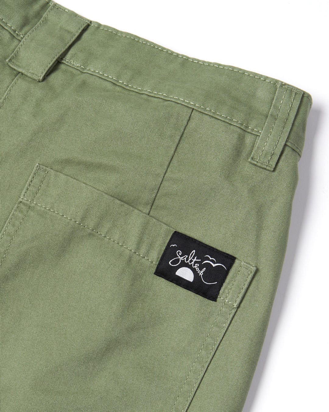 Olive green Liesl - Womens Chino Short - Green trousers with a Saltrock woven label on the back pocket.