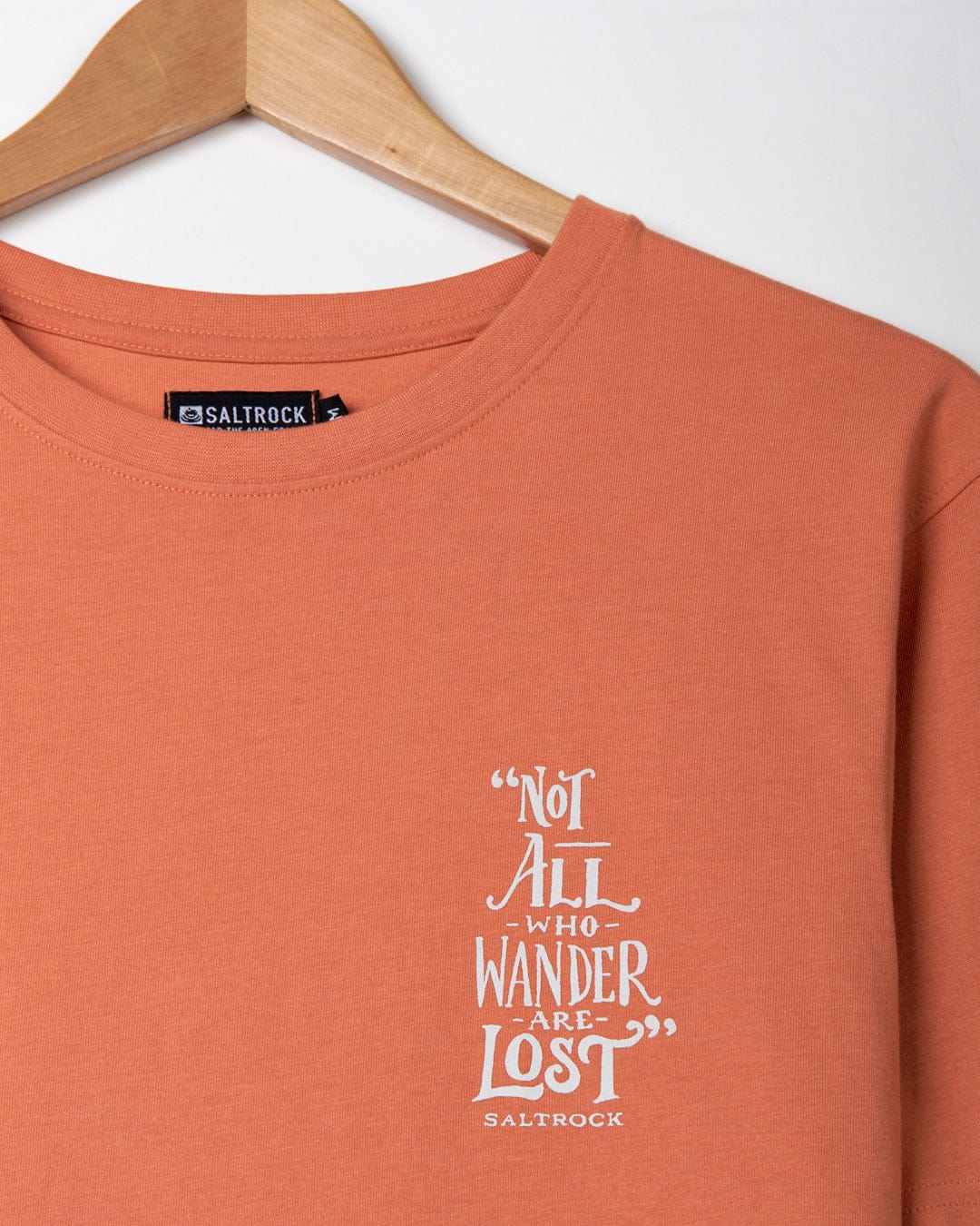 This Lost Ships - Mens Short Sleeve T-Shirt - Orange from Saltrock branding is made of a Cotton/Polyester blend, featuring the Saltrock classic design with the phrase "not all who wander are lost.