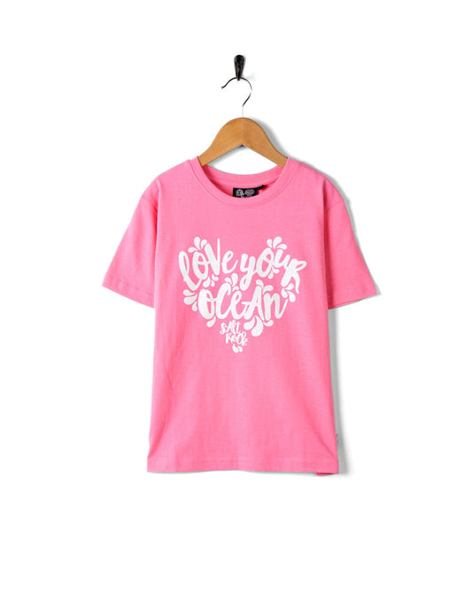 A Love Your Ocean - Kids Short Sleeve T-Shirt - Pink from Saltrock with a white heart on it.