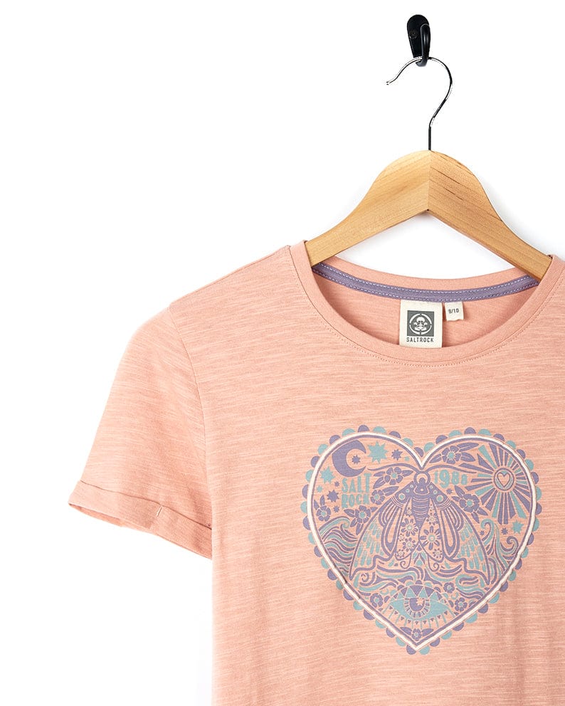 A women's Magic Moth - Kids Short Sleeve T-Shirt - Pink with a heart design featuring Saltrock branding.