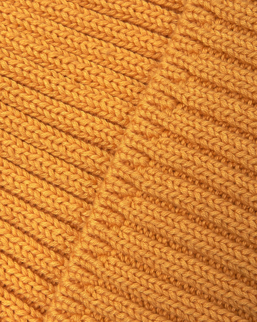 A close up of a warm Saltrock Maine - Fisherman Beanie - Yellow.