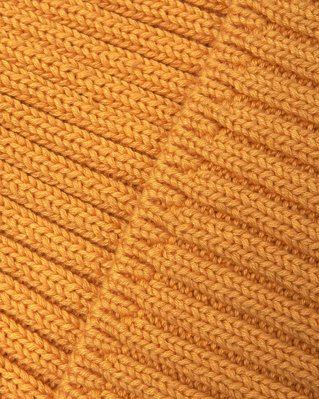A close up of a warm Saltrock Maine - Fisherman Beanie - Yellow.