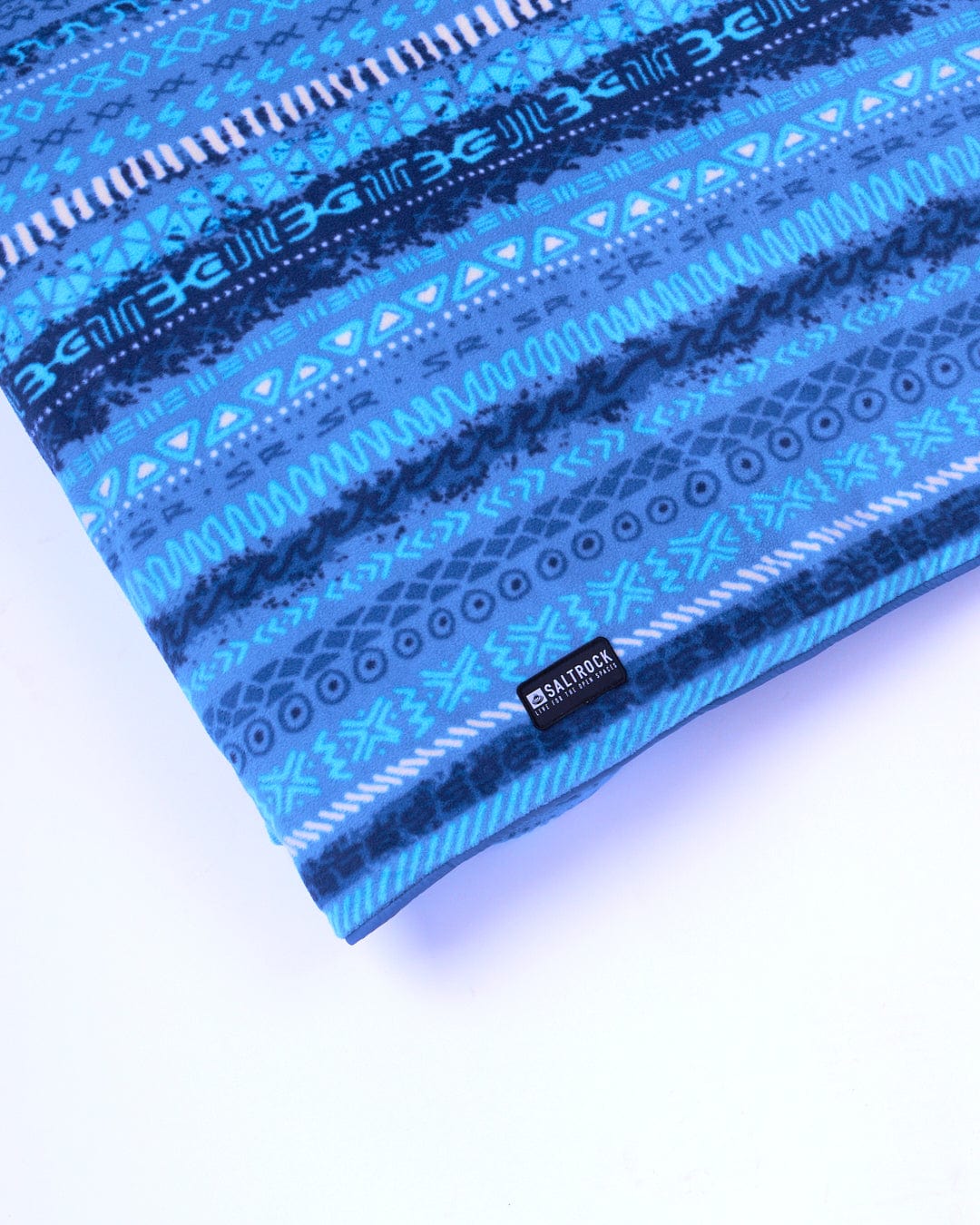 A Marks - Unisex Recycled Reversible Poncho - Blue water resistant blue and white striped pillow made from recycled material.
