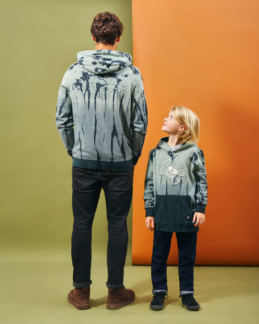 A man and a child stylishly standing next to each other in a Saltrock Live And Let - Kids Tie Dye Pop Hoodie - Green.
