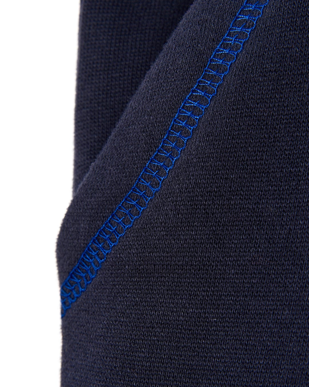 A close up of a Saltrock Morte Point Kids Sweat Shorts - Blue with blue stitching.