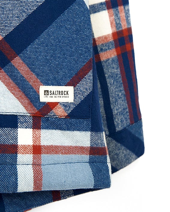 A close up of a Saltrock Myla - Womens Hooded Checked Shacket - Blue Check with front pockets.