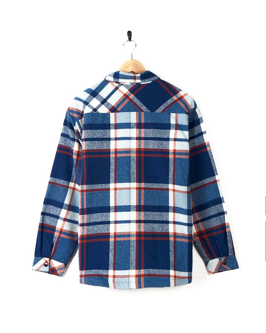 A Saltrock Myla - Womens Hooded Checked Shacket - Blue Check hanging on a hanger with front pockets.