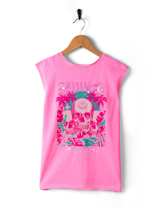 Pink sleeveless Mystic Skulls - Recycled Kids Longline Vest by Saltrock hanging on a wall-mounted hook.