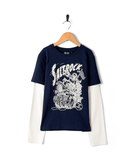 Navy blue raglan t-shirt with white sleeves and Saltrock Illustration hanging on a wall-mounted hook.