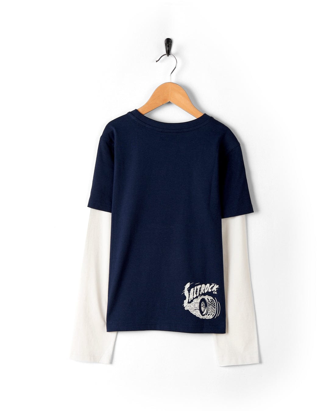 Navy blue and cream raglan t-shirt with Crew Neckline and Saltrock Illustration hanging on a wall-mounted coat hanger.