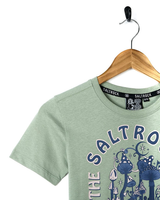 A "No Shroom - Kids Short Sleeve T-Shirt - Light Green" with the words "Saltrock" on it.