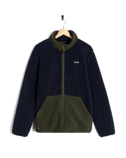 An Odin - Mens Zip Thru Fleece - Dark Blue jacket from Saltrock on a hanger.