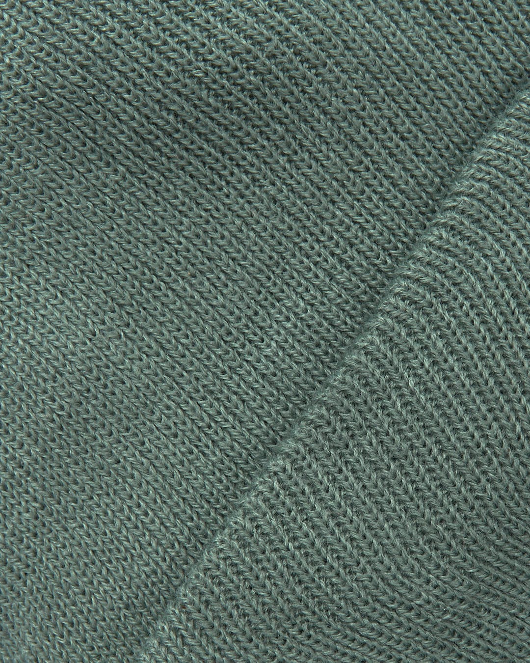 A close up image of a Saltrock Ok - Tight Knit Beanie - Light Green fabric.