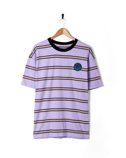 Striped purple oversized t-shirt with a retro surf badge logo on the chest, hanging against a white background. (SR Original - Mens Short Sleeve T-Shirt - Purple by Saltrock)