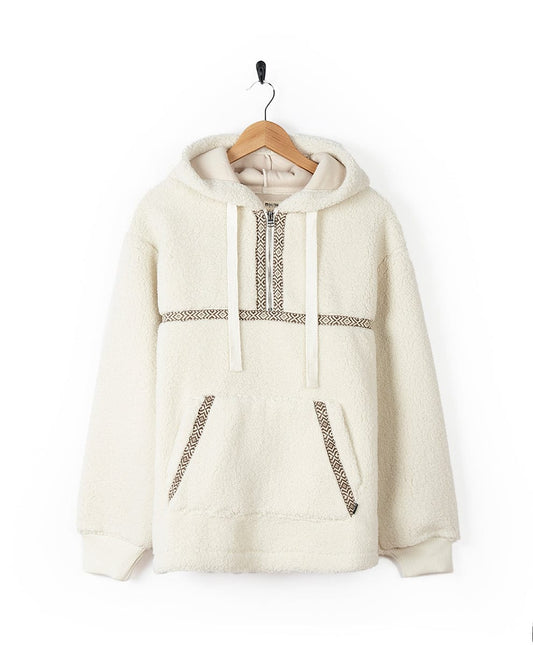 A white Orlina - Womens Fleece Pop Hoodie with a hood hanging on a hanger from Saltrock.