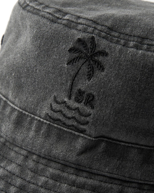 Close-up of a black cotton Palm Bucket Hat - Dark Grey with an embroidered Saltrock palm tree and waves design.