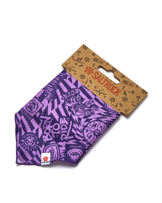 A package of Saltrock branded dog bandanas with a purple all-over print and brown graphics on a white background.