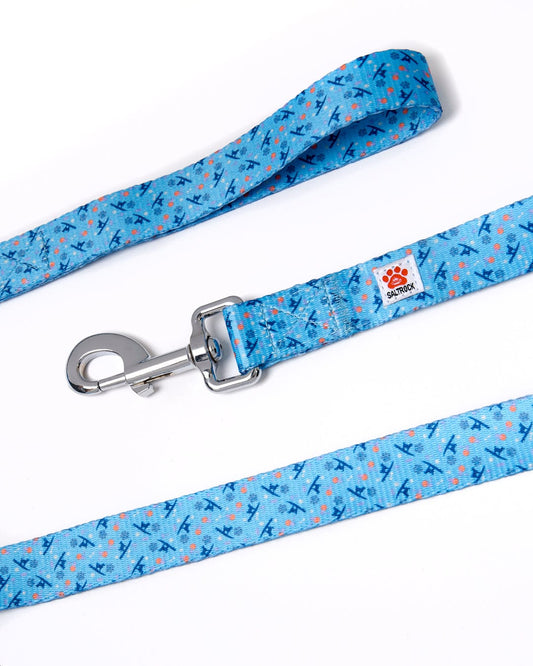 A Paw Print - Dog Lead - Blue with a surf print pattern and a metal clip for Saltrock branding.
