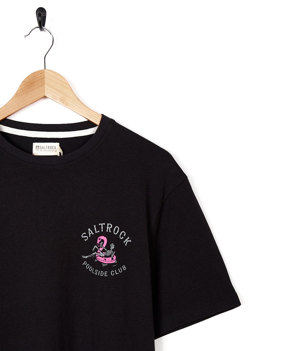 A Poolside - Womens Short Sleeve T-Shirt - Black with a pink logo on it. (Brand: Saltrock)