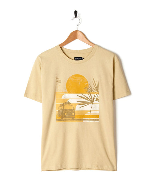 An oversized Saltrock t-shirt featuring a sunset scene at the beach.