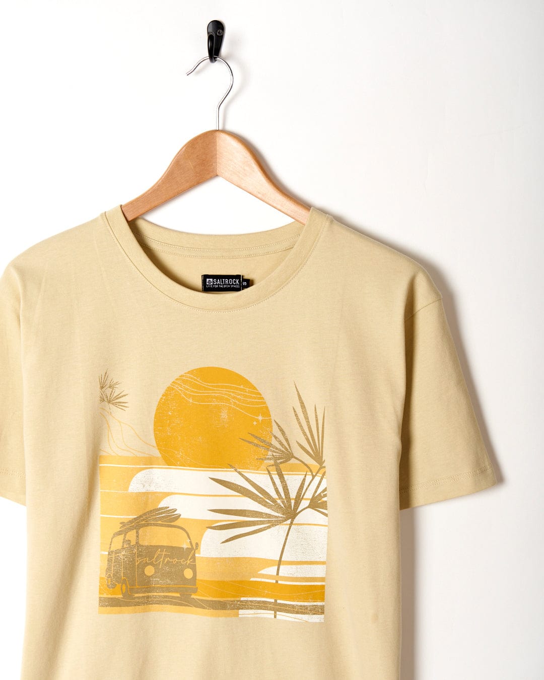 This Saltrock Women's Short Sleeve T-Shirt in Yellow features a stunning sunset scene with a palm tree.
