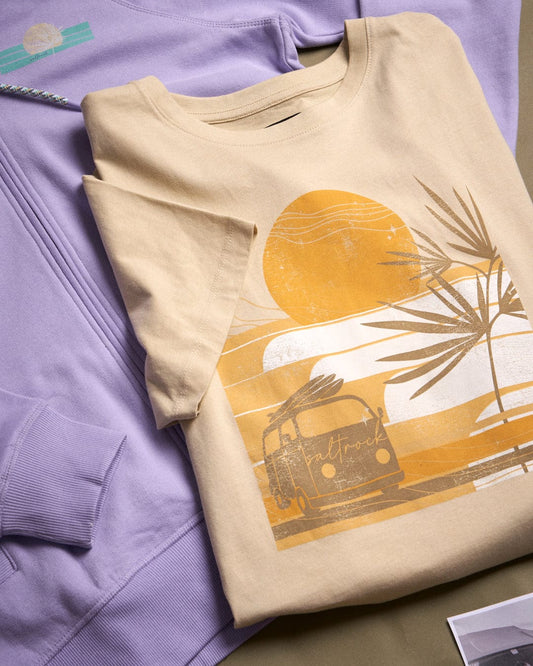A Saltrock graphic t-shirt with an oversized image of a beach and sunset.