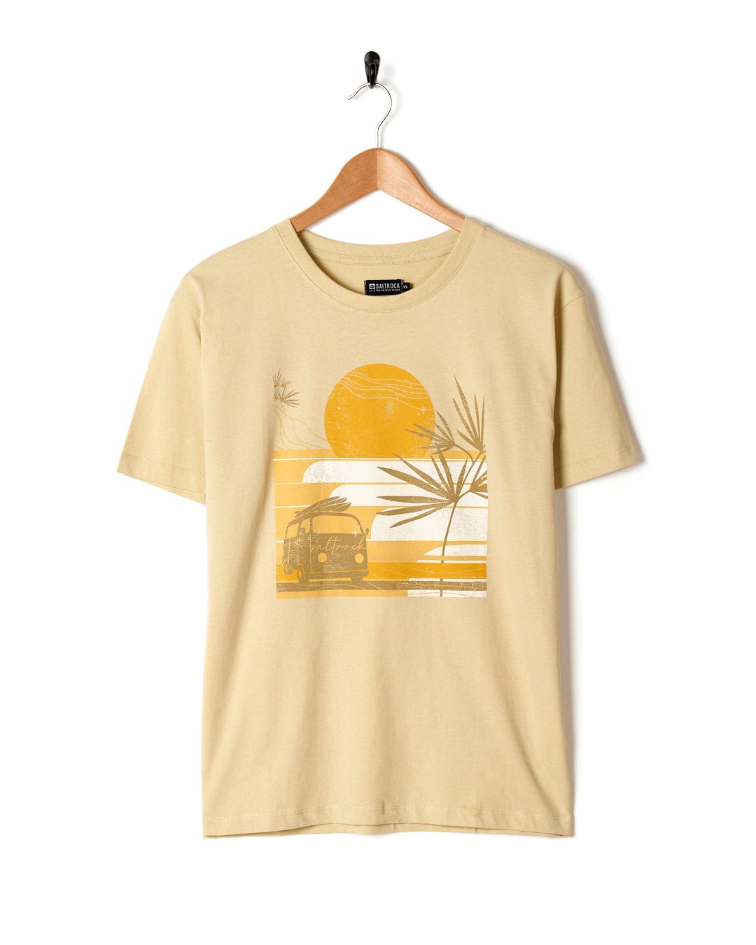 An oversized Saltrock t-shirt featuring a sunset scene at the beach.