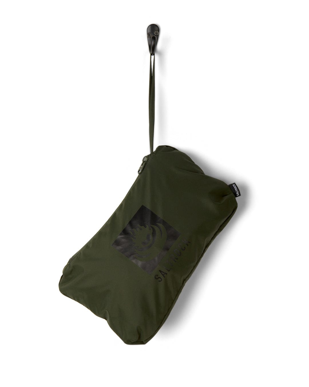 Green Rainier - Mens Packable Waterproof Jacket with a black strap and hook, featuring a Saltrock logo on the front, suspended against a white background.