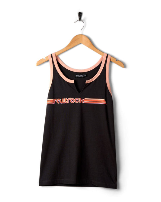 Dark Grey tank top with pink trim and Saltrock logo, crafted in 100% cotton, hanging on a metal hanger against a white background.