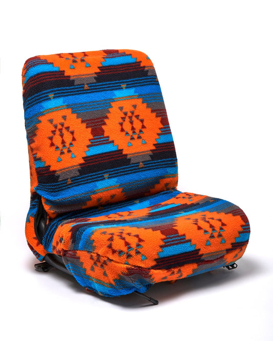 A Saltrock waterproof seat cover with an orange and blue southwestern pattern.