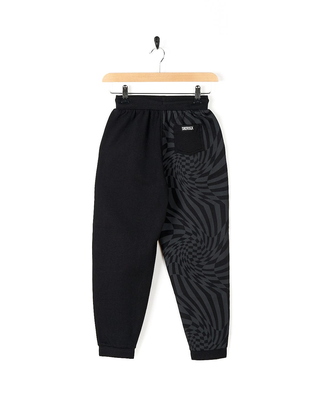 A stylish Saltrock Rip It - Kids Jogging Bottom - Black with a black and grey pattern, offering both comfort and style.